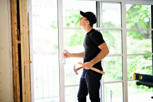 man installing sliding door in DFW